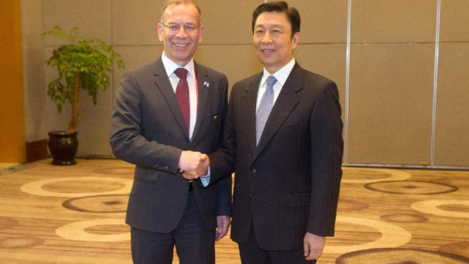 Chinese Vice President Li Yuanchao (R) meets with the President of the Council of States of Switzerland's Federal Assembly Hannes Germann, who came to China to attend the Eco Forum Global Annual Conference 2014, in Guiyang, capital of southwest China's Guizhou Province, July 10, 2014. (Xinhua/Ou Dongqu)